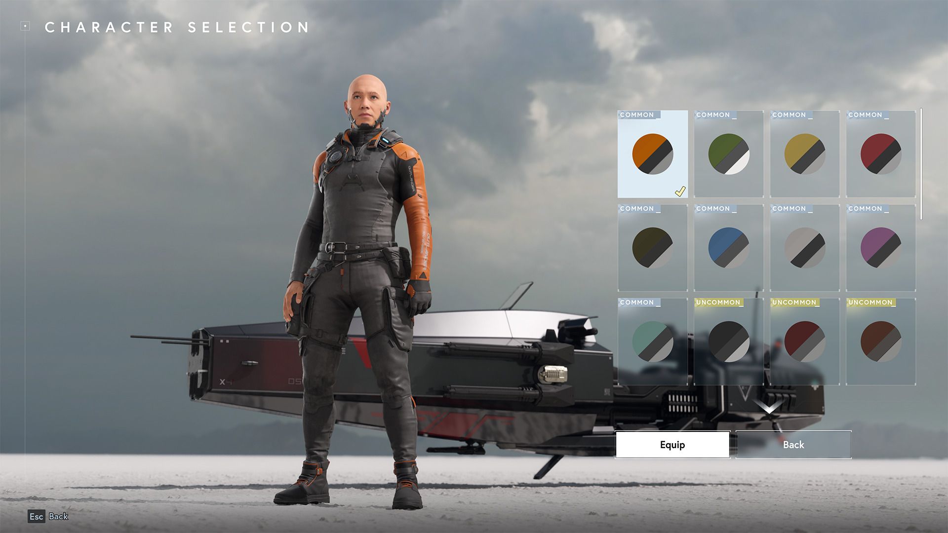 Video game character selection screen showing a bald man in an orange and black suit, with a spaceship and color customization options.