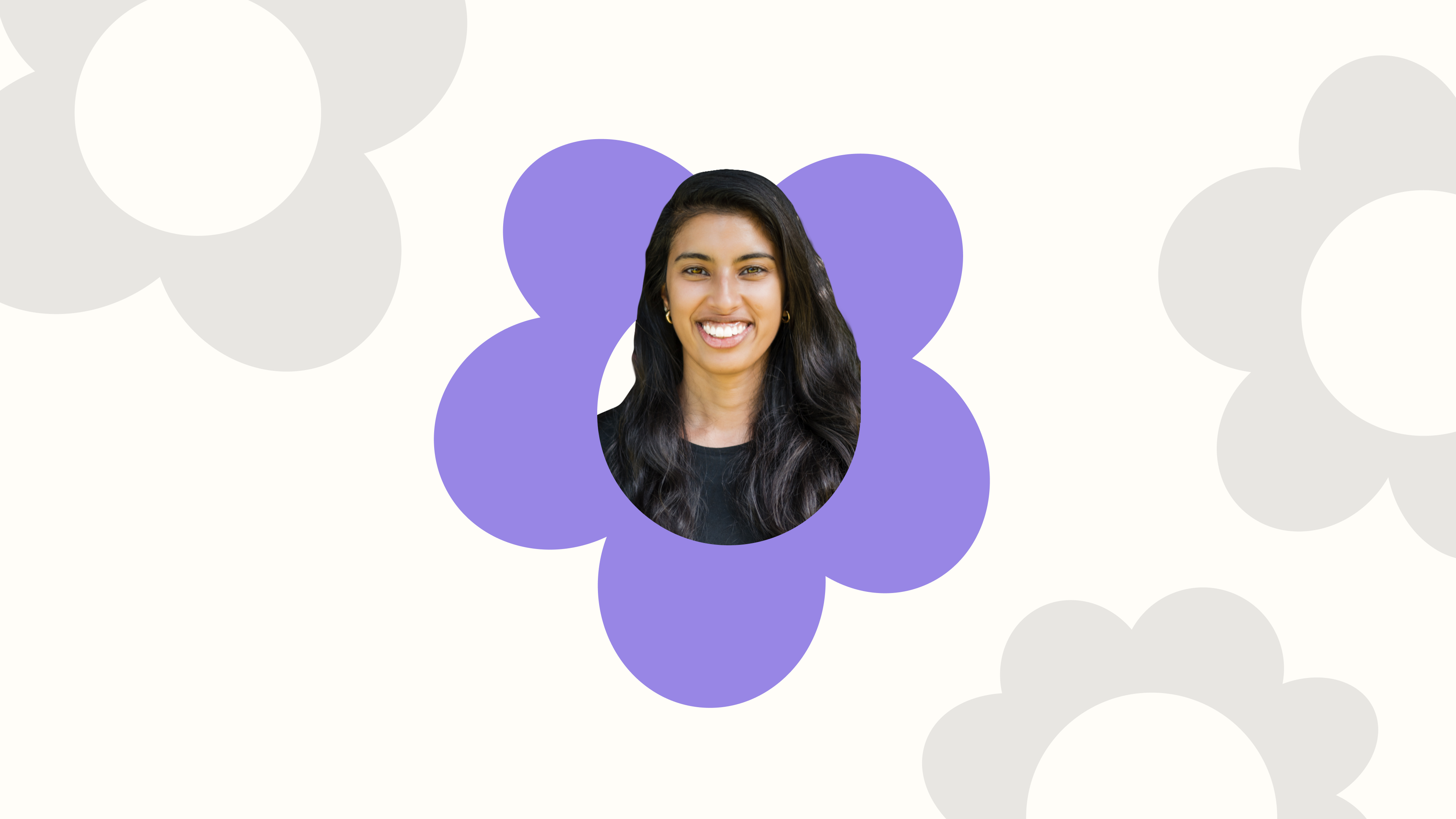 a woman is smiling in a purple flower on a white background